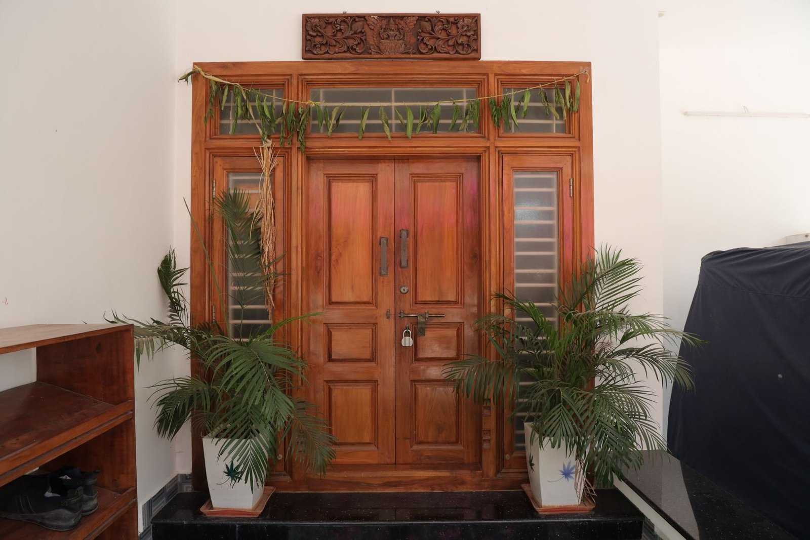 Carved teak entrance doors